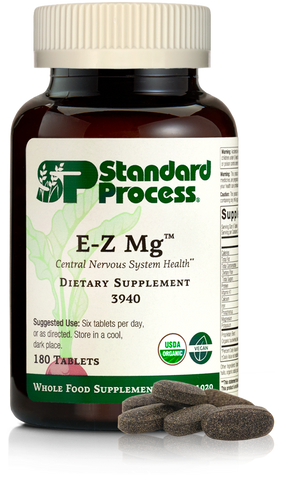  - Image of E-Z Mg bottle next to tablets of magnesium supplements.